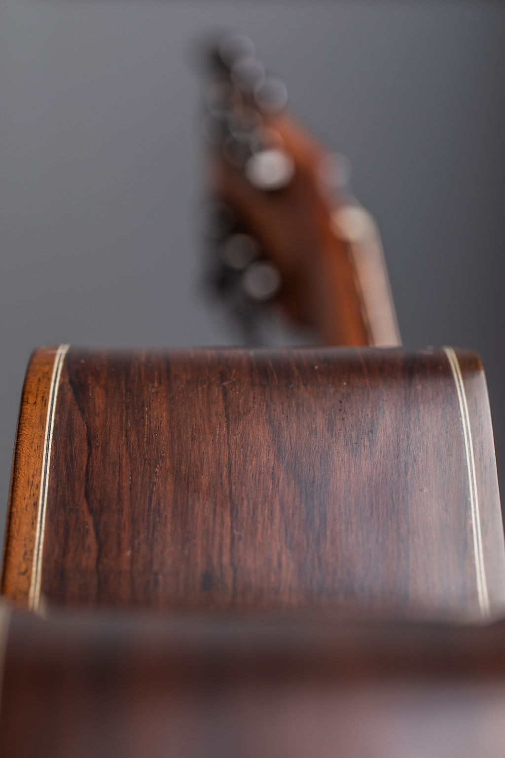 Fine woodworking details on a handcrafted Arden guitar
